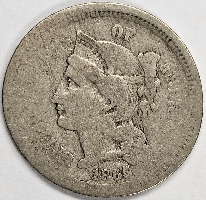 1865 Nickel Three Cent Piece . . . . About Good