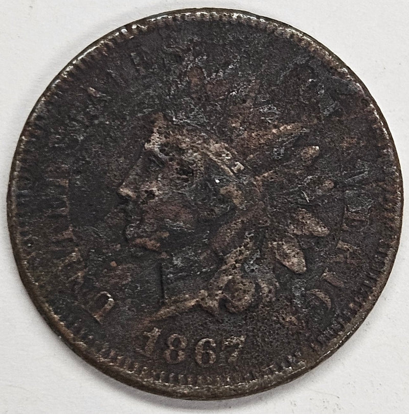 1867 Indian Cent . . . . VF heavy corrosion