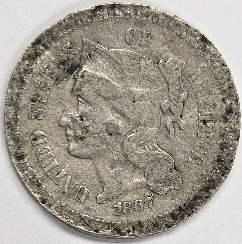 1867 Nickel Three Cent Piece . . . . VF badly damaged