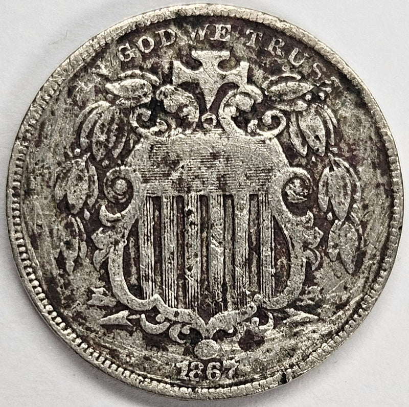 1867 Shield Nickel . . . . VG badly corroded