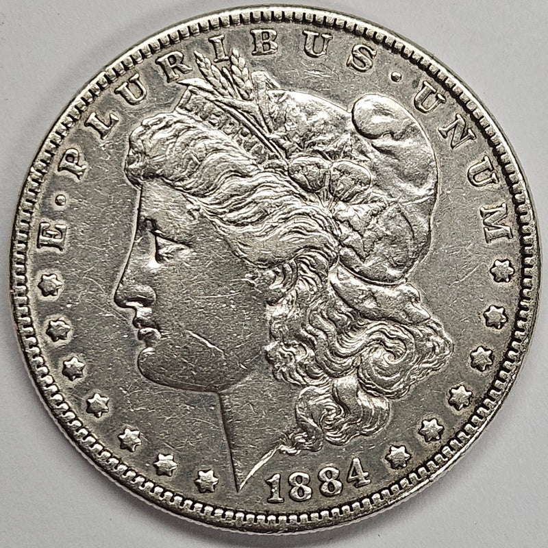 1884 Morgan Dollar . . . . AU cleaned