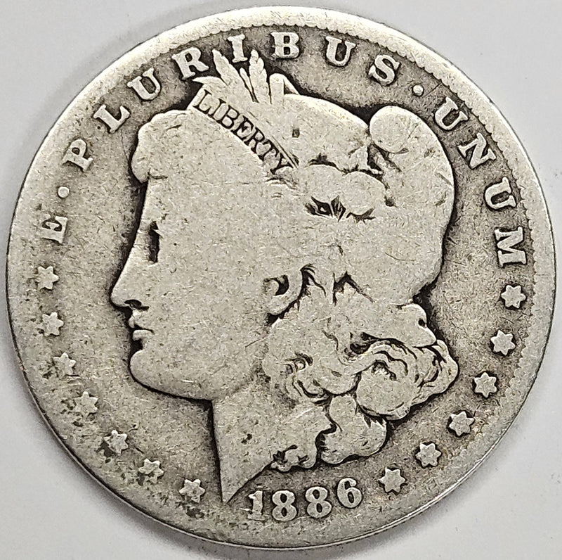 1886-O Morgan Dollar . . . . Good