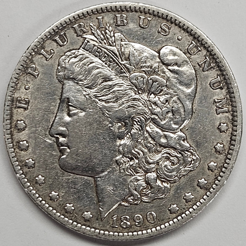 1890-O Morgan Dollar . . . . AU cleaned