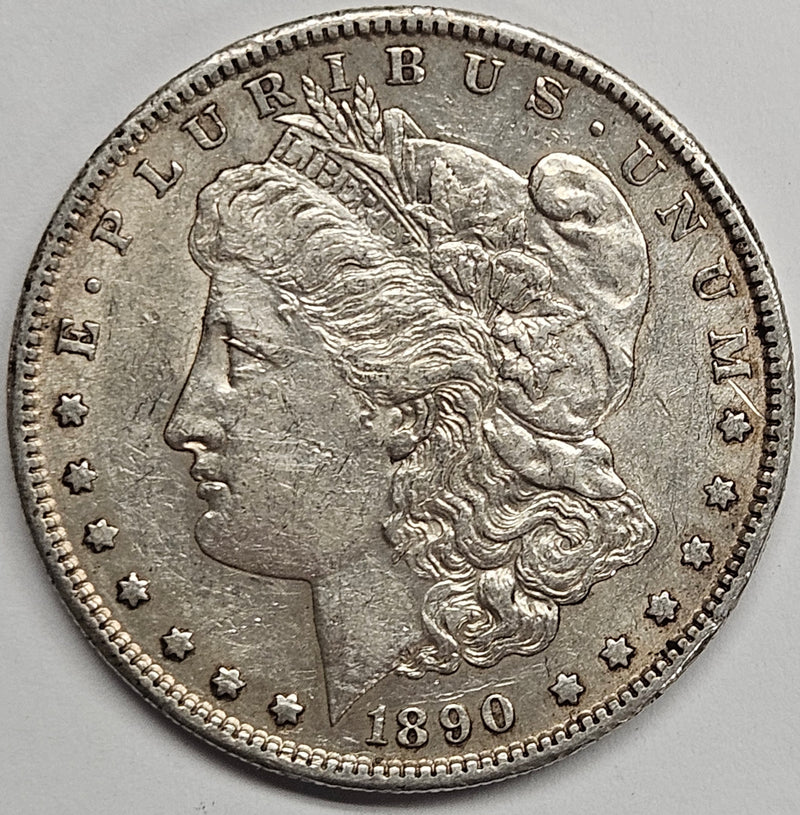 1890-S Morgan Dollar . . . . AU rim bump