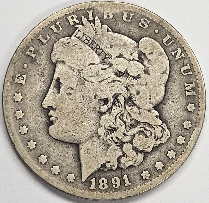 1891-CC Morgan Dollar . . . . Very Good