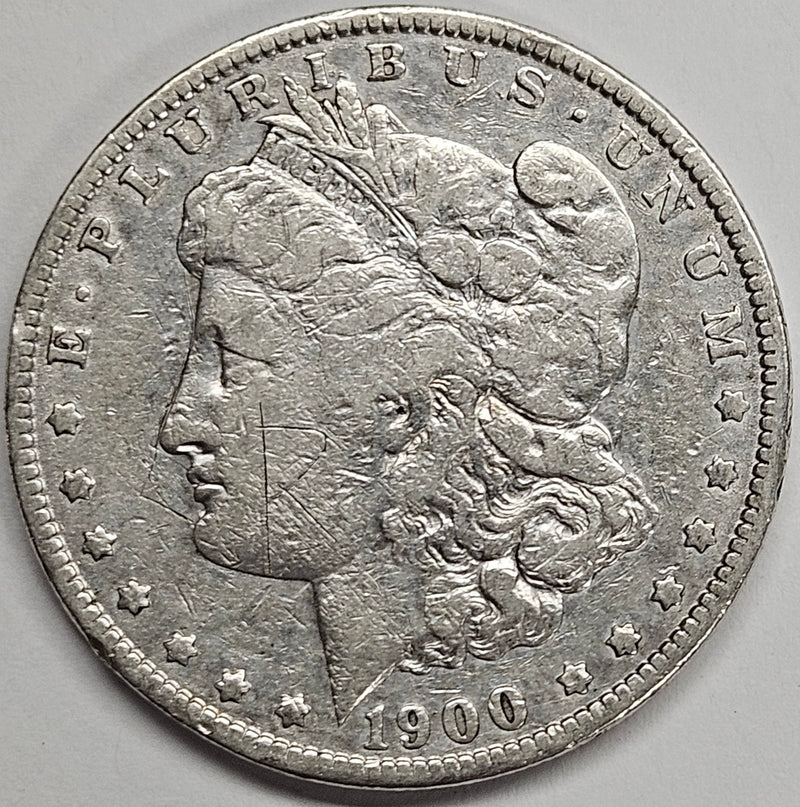 1900-O/CC Morgan Dollar . . . . Fine graffiti