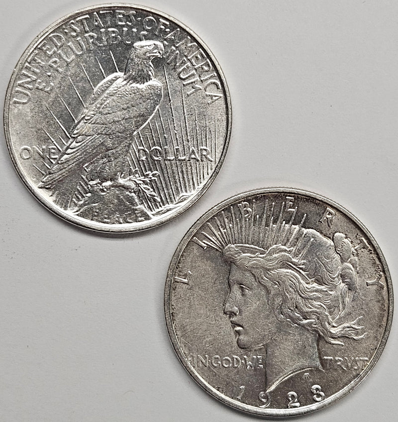 1922-D and 1923-D Peace Dollars . . . . Select Brilliant Uncirculated