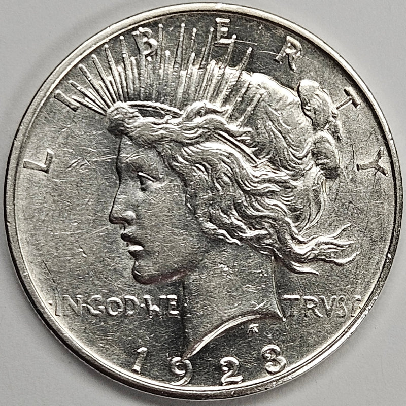 1923-D Peace Dollar . . . . Choice About Uncirculated