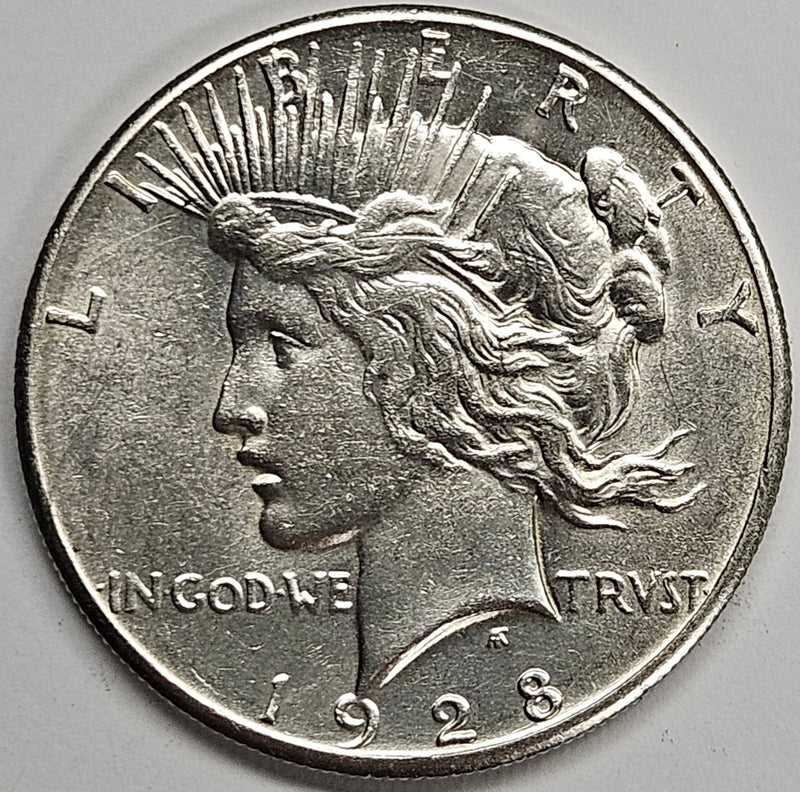 1928 Peace Dollar . . . . Select BU+