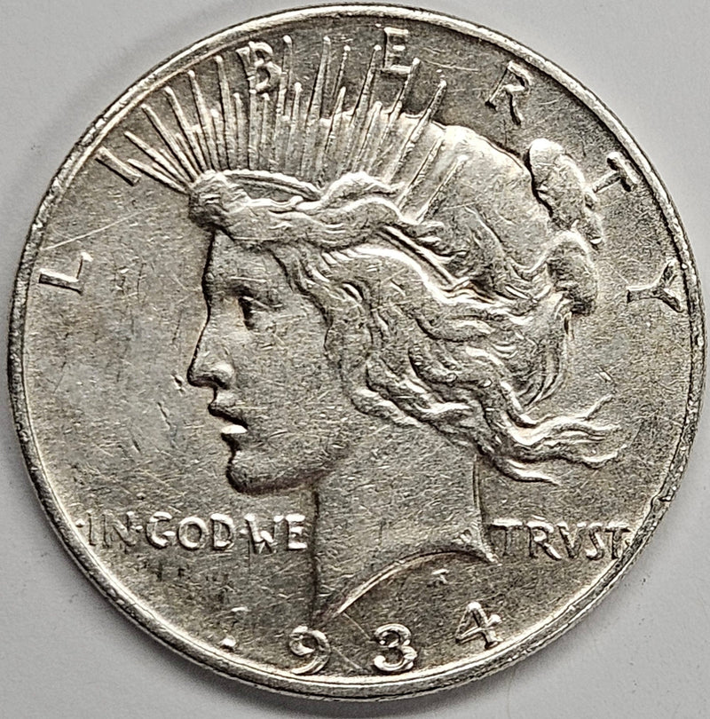 1934-D Peace Dollar . . . . Choice About Uncirculated