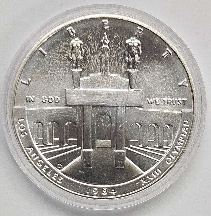 1984-D LA Olympic Coliseum Silver Dollar . . . . Gem BU in original U.S. Mint Capsule