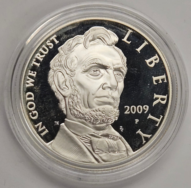 2009-P Abraham Lincoln Bicentennial Silver Dollar . . . . Gem Brilliant Proof in original U.S. Mint Capsule