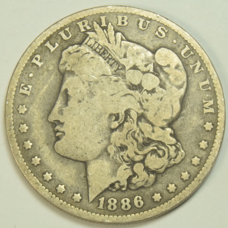 1886-O Morgan Dollar . . . . Fine