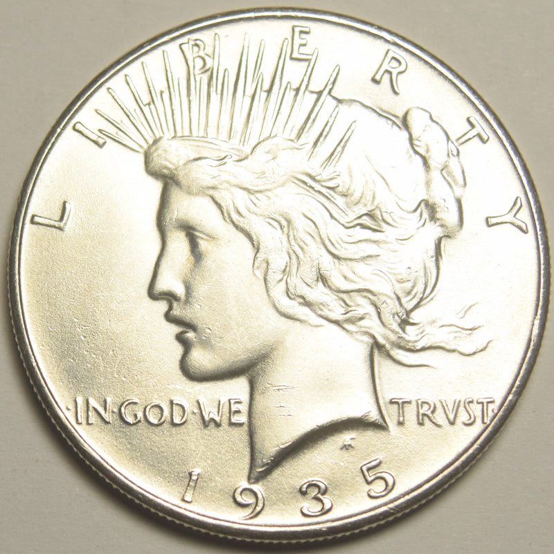 1935 Peace Dollar . . . . Choice BU+