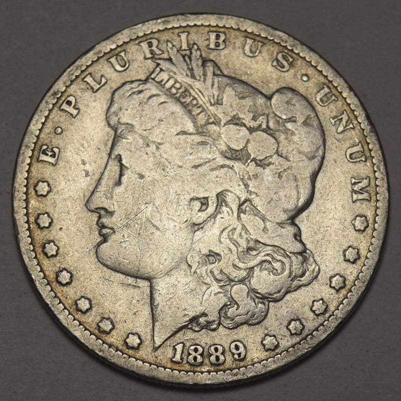 1889-O Morgan Dollar . . . . Very Good