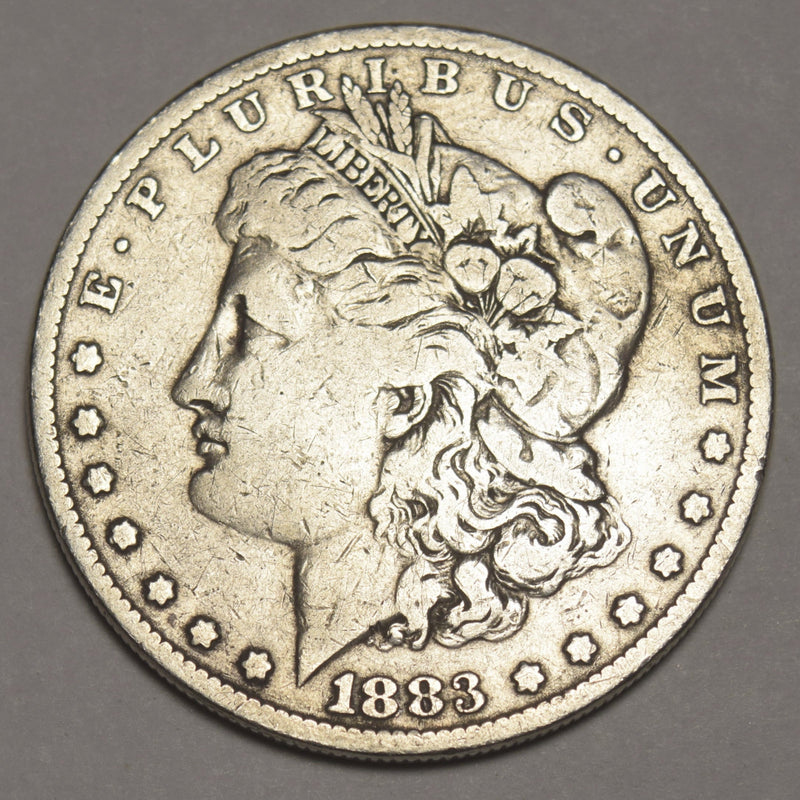 1883 Morgan Dollar . . . . Fine