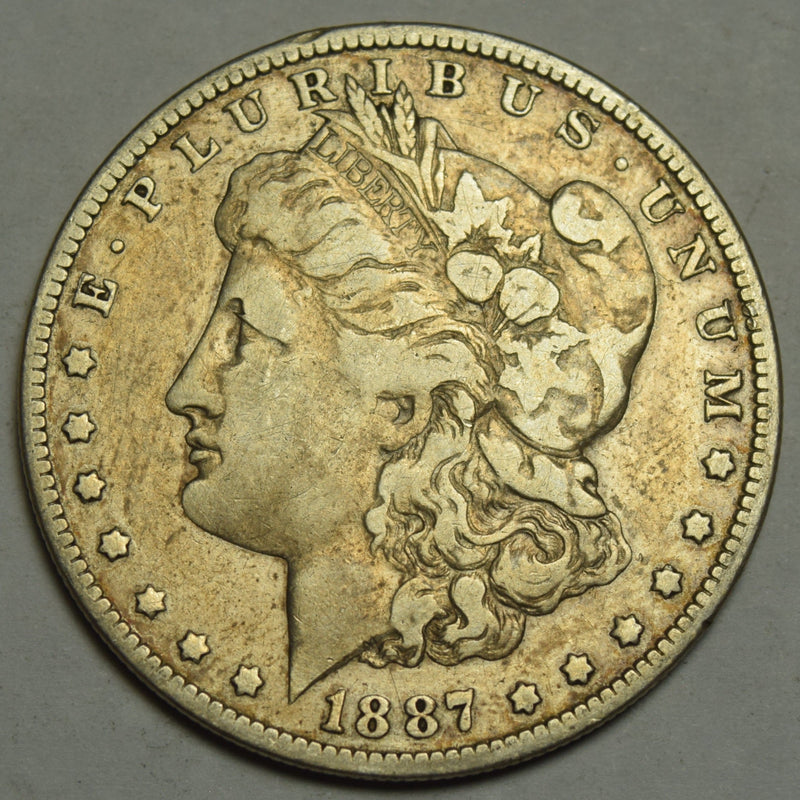 1887-O Morgan Dollar . . . . Fine