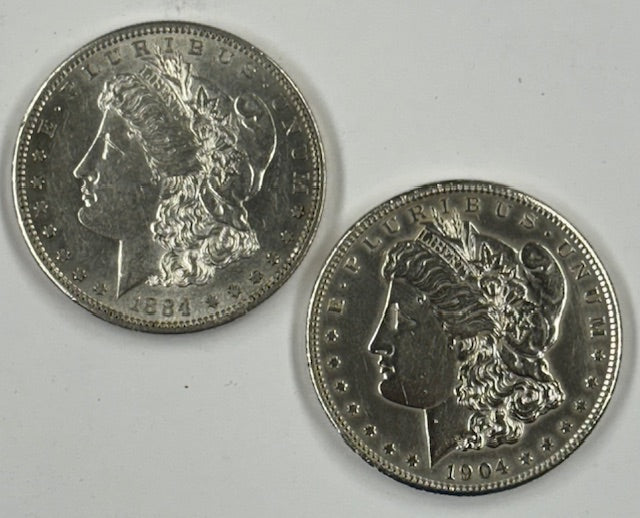 1884-S and 1904-S Morgan Dollar . . . . Choice About Uncirculated