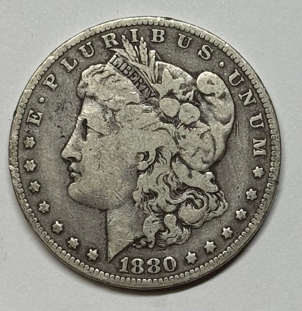 1880-O Morgan Dollar . . . . Fine