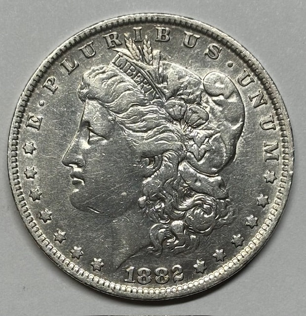 1882-O/S Morgan Dollar . . . . AU cleaned