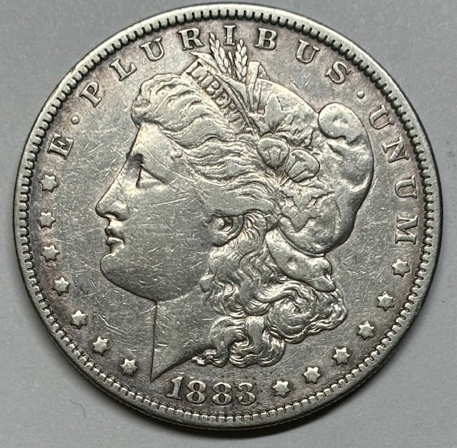 1883 Morgan Dollar . . . . VF/XF