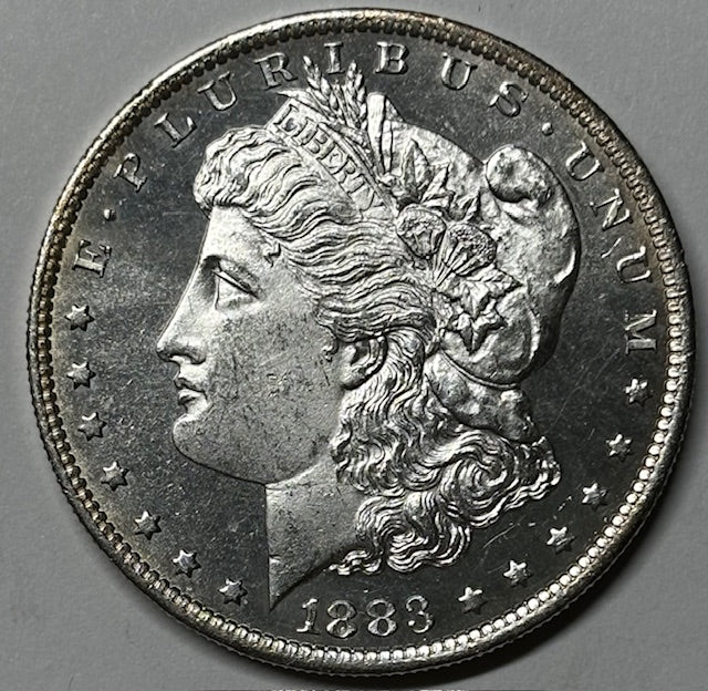 1883-O Morgan Dollar . . . . Choice BU+ DMPL