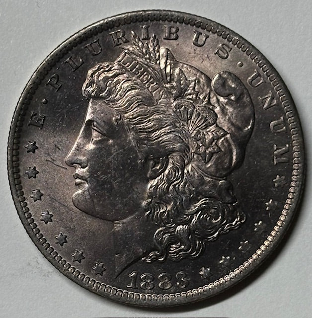 1883-O Morgan Dollar . . . . Gem Uncirculated Toned