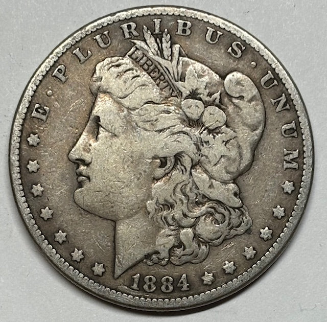 1884 Morgan Dollar . . . . Very Good