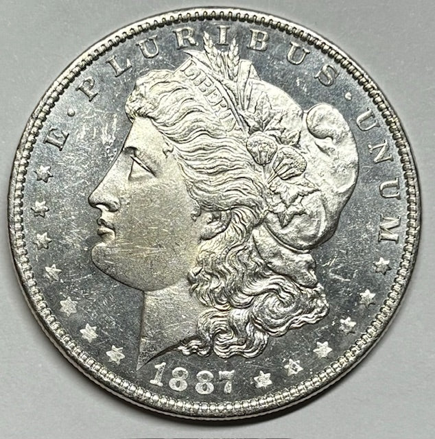 1887 Morgan Dollar . . . . Choice BU DMPL