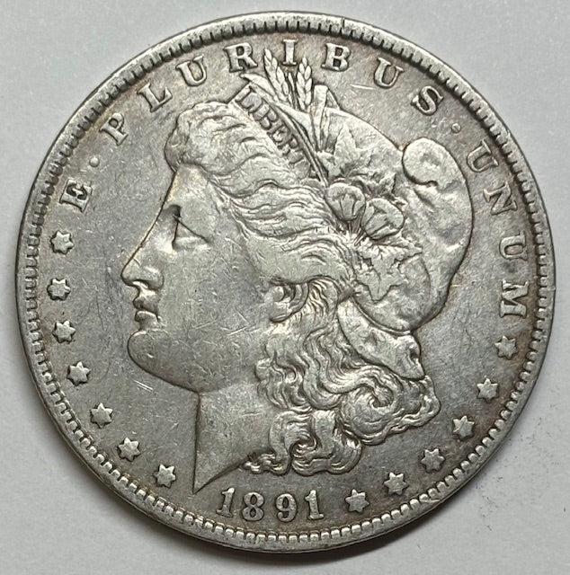 1891-O Morgan Dollar . . . . VF cleaned