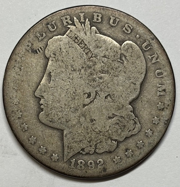 1892-O Morgan Dollar . . . . About Good