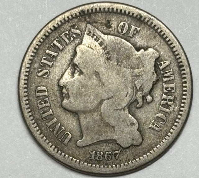 1867 Nickel Three Cent Piece . . . . Fine reverse scratch