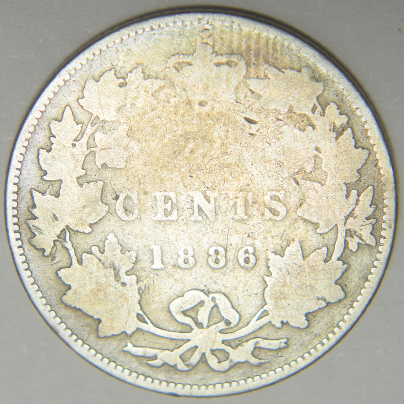 1886 Canadian Quarter  About Good